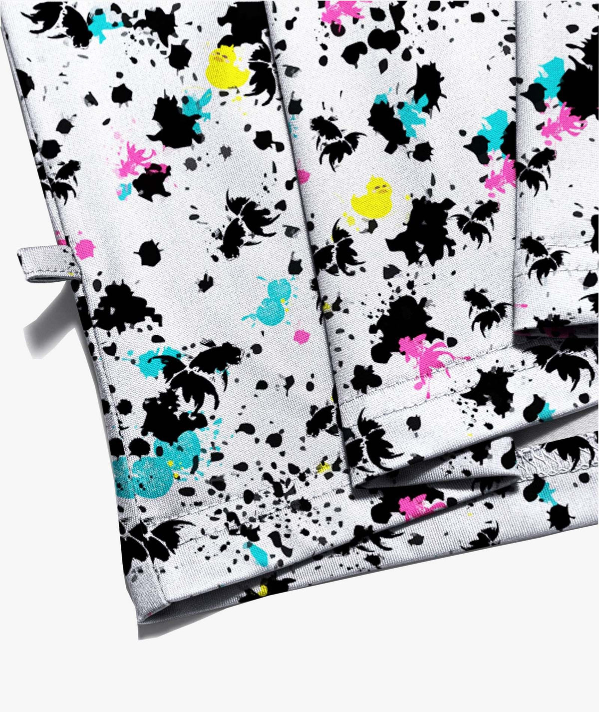 Polo con cremallera y estampado salpicado