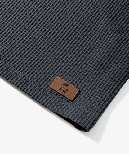 Polo de performance en maille gaufrée