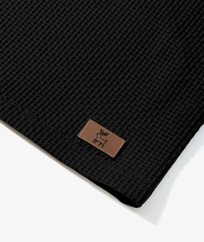 Polo de performance en maille gaufrée