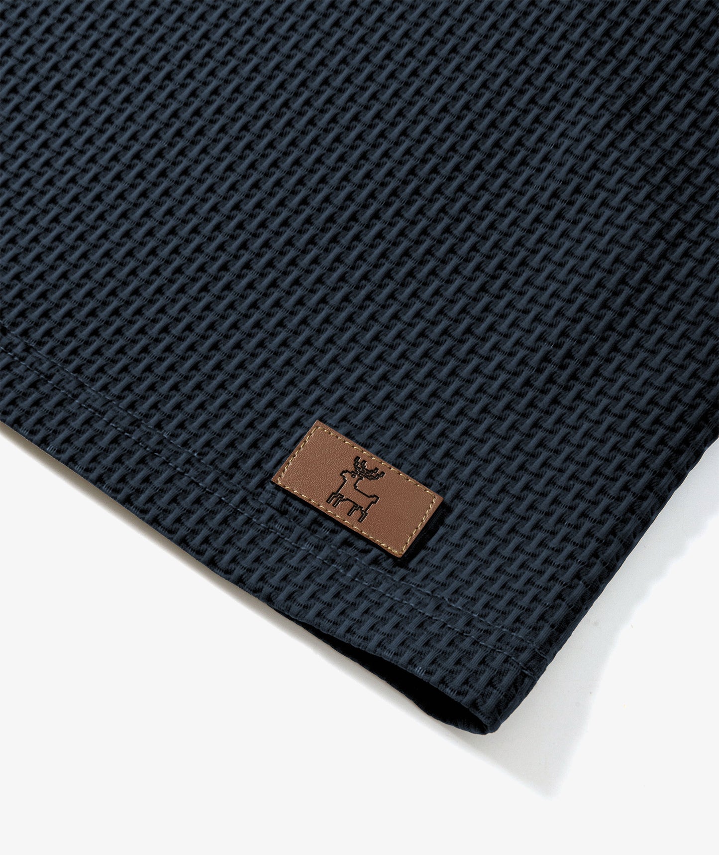 Polo de performance en maille gaufrée