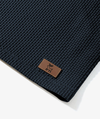 Polo de performance en maille gaufrée